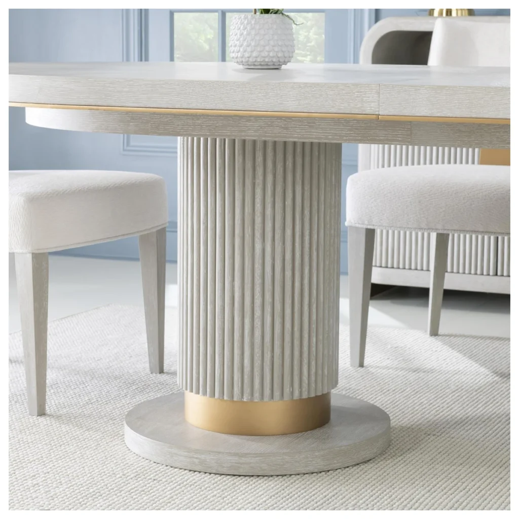 Close view of the fluted pedestal and gold-tone base on the 3300-421K table